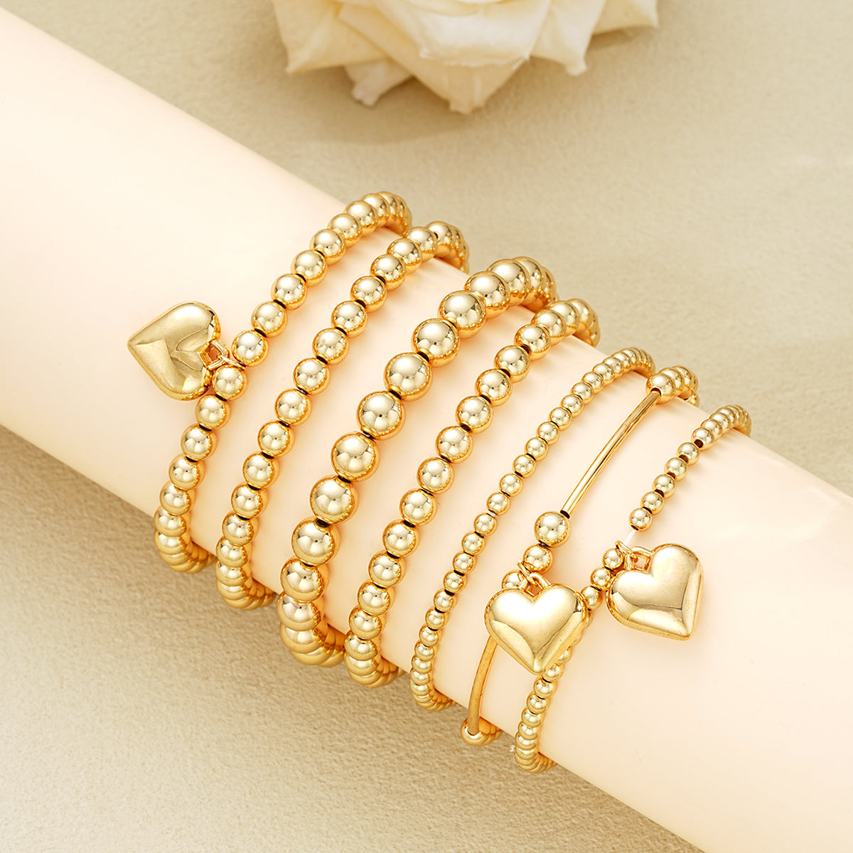 Set of 7 Gold Beaded Heart Charm Bracelets
