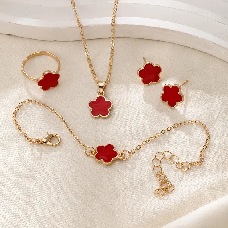 Delicate Floral Clover Jewelry Set: Necklace, Bracelet, Earrings, and Rings