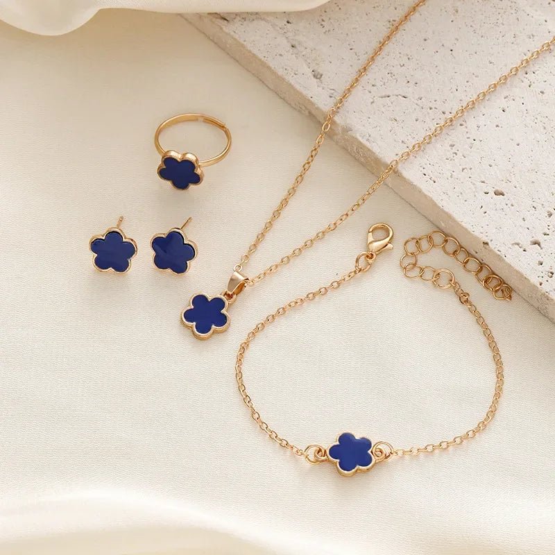 Delicate Floral Clover Jewelry Set: Necklace, Bracelet, Earrings, and Rings