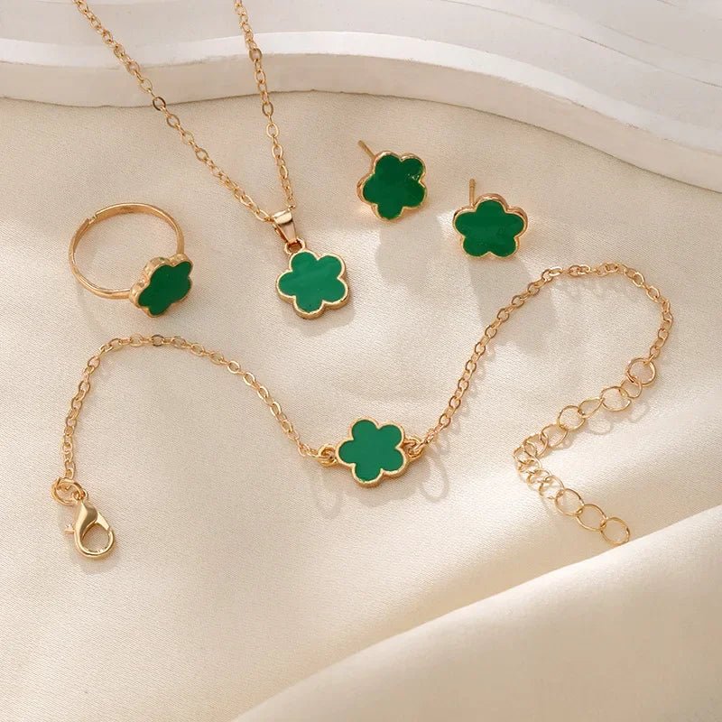 Delicate Floral Clover Jewelry Set: Necklace, Bracelet, Earrings, and Rings