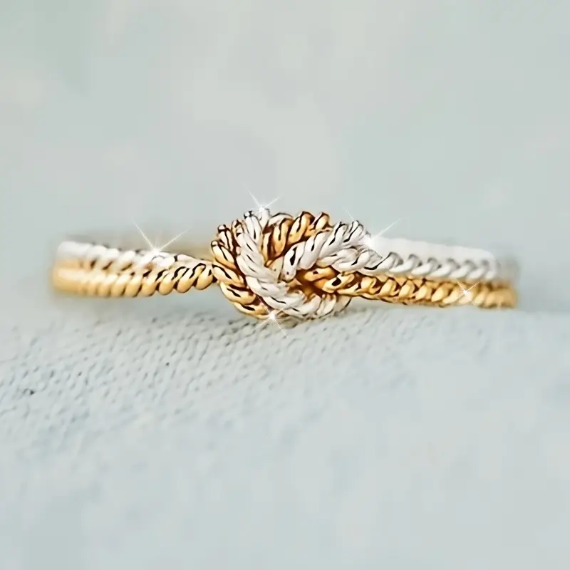 Knotted Ring in Gold and Silver