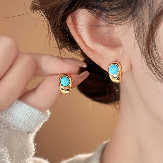 Classic Curved Copper Earrings with Timeless Turquoise