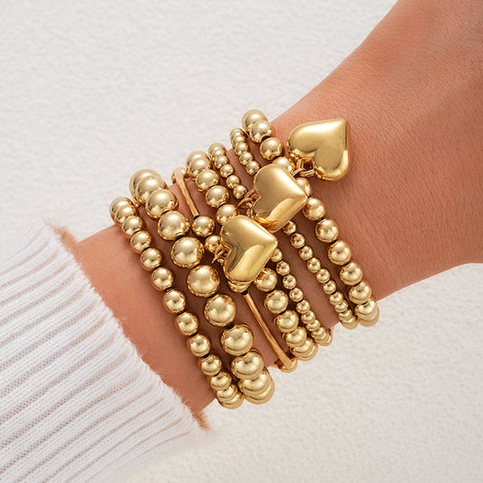 Set of 7 Gold Beaded Heart Charm Bracelets