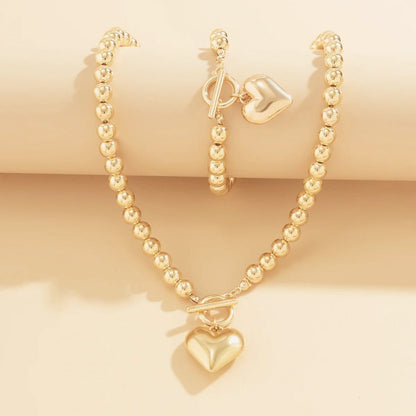 Heart-Shaped Beaded Pendant Bracelet and Necklace Duo
