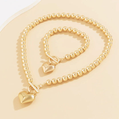 Heart-Shaped Beaded Pendant Bracelet and Necklace Duo