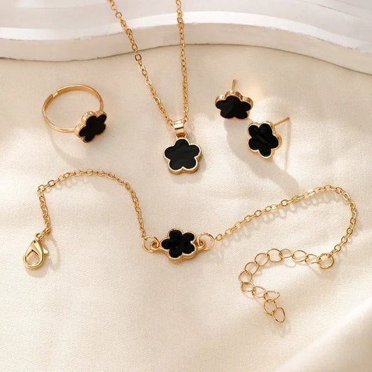 Delicate Floral Clover Jewelry Set: Necklace, Bracelet, Earrings, and Rings